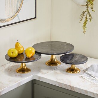 The Novogratz Black Aluminum Cake Stand with Gold Base