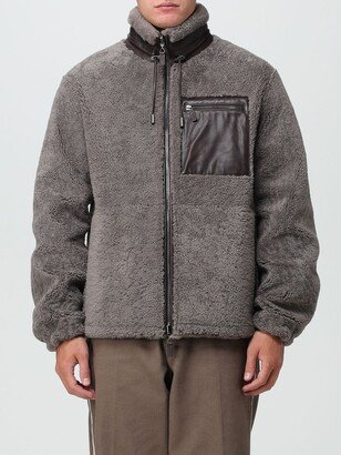 reversible jacket in leather and shearling