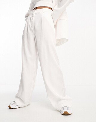 wide leg pants in white - part of a set