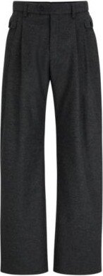 Relaxed-fit pants in virgin wool with buttoned pockets