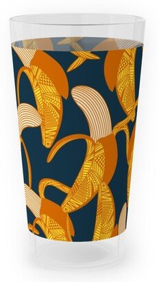 Outdoor Pint Glasses: Peeled Banana - Yellow On Navy Outdoor Pint Glass, Yellow