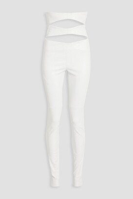 Cutout leather skinny pants