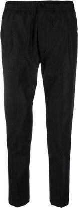 Riviera slim-cut tapered trousers