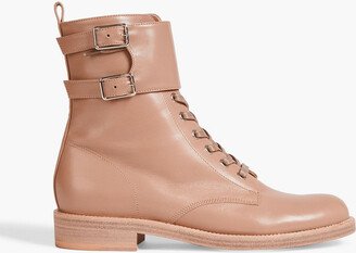 Buckled leather combat boots