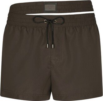 Short swim trunks with double waistband and branded tag-AA