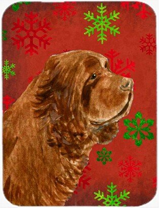 SS4717LCB Sussex Spaniel Red and Green Snowflakes Christmas Glass Cutting Board