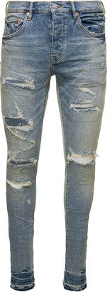 Light Blue Skinny Jeans With Rips Detail In Stretch Cotton Denim Man