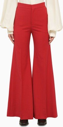 Wide red bell-bottom trousers