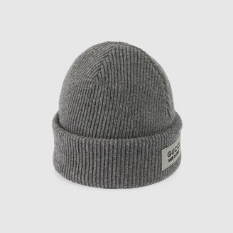 Knit wool hat with patch