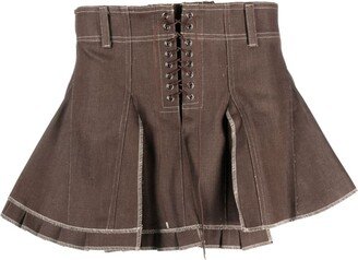 Mirage box-pleat mini skirt