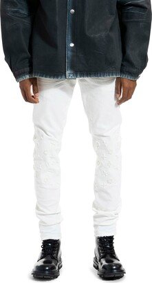 Tuffetage Monogram 3D Distressed Skinny Jeans