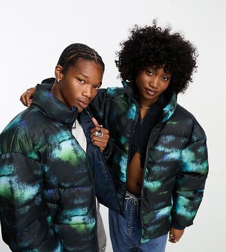 Unisex tie dye puffer coat in blue and black