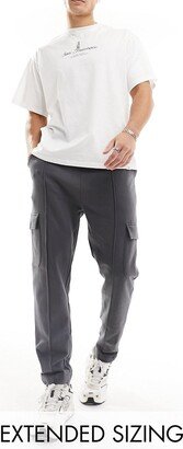 tapered cargo sweatpants with pin tuck in washed black