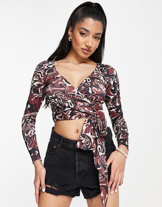 wrap long sleeve cropped top in brown swirl print