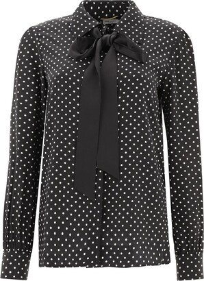 Polka dot blouse with bow