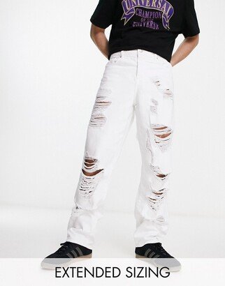 baggy jeans with heavy rips in white-AA