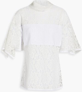 Crepe de chine-paneled flocked lace blouse