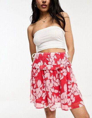 frill detail mini skirt in red and pink floral