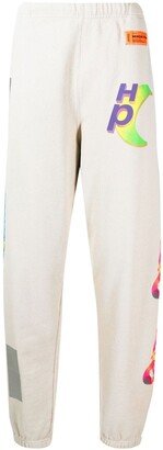 Global-print cotton track pants