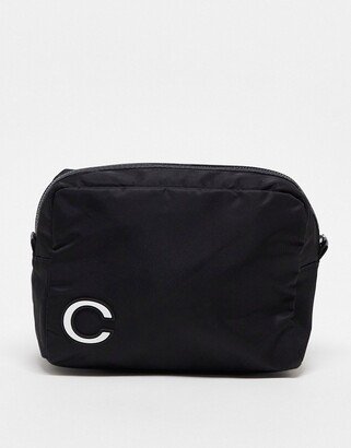 toiletries bag with C initial in black