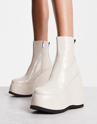 Roxanne wedge boots in cream patent
