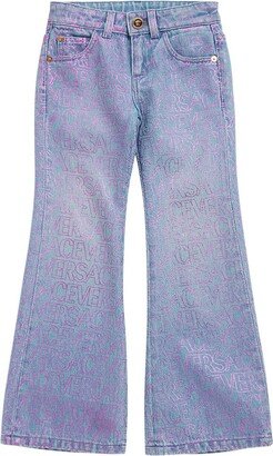 All over logo print cotton denim jeans
