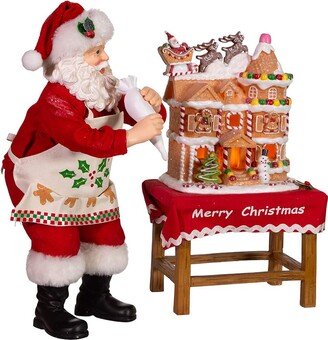 Kurt S. Adler Kurt Adler 10.5-Inch Battery-Operated Fabriche Santa Decorating LED Gingerbread House Table Piece (JEL1203)