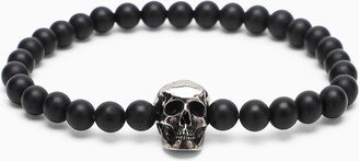 Skull bracelet with black pearls