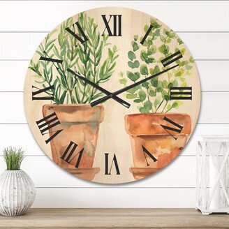 Designart 'Two Green House Plants In Orange Flower Pots' Traditional Wood Wall Clock