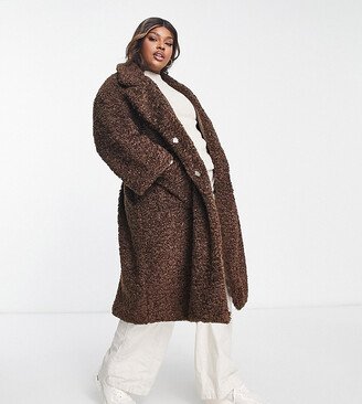 QED London Plus teddy longline coat with PU belt in chocolate brown