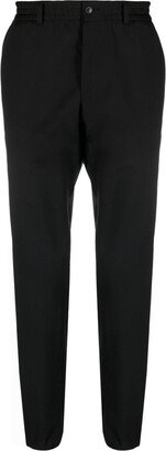 Chase logo-patch tapered trousers