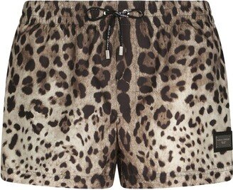 Short swim trunks with leopard print