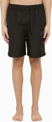 Black swim boxer shorts with prints