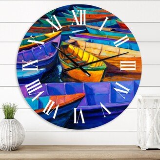 Designart 'Boats Resting On The Water During Warm Sunset II' Nautical & Coastal wall clock