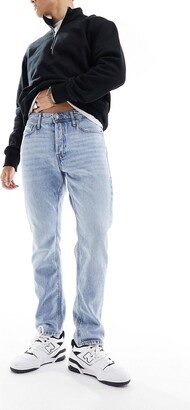 Essentials Chris relaxed fit jean with abrasion in light wash blue