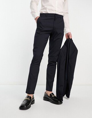 skinny suit pants in navy pinstripe