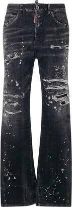 Distressed mid rise wide leg jeans