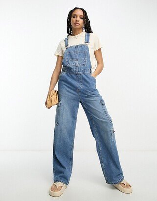 denim cargo overalls in mid blue