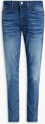 L'Homme skinny-fit faded whiskered denim jeans