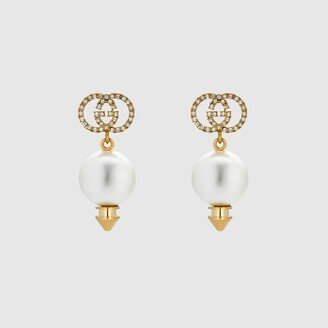 Interlocking G earrings with pearl