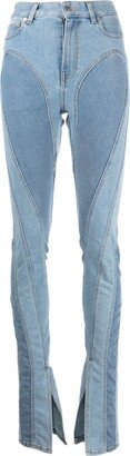 Spiral split-hem skinny jeans