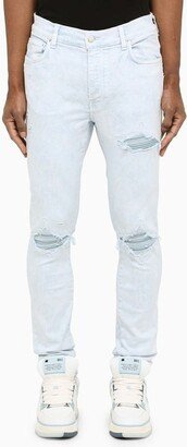 Light skinny jeans with wears