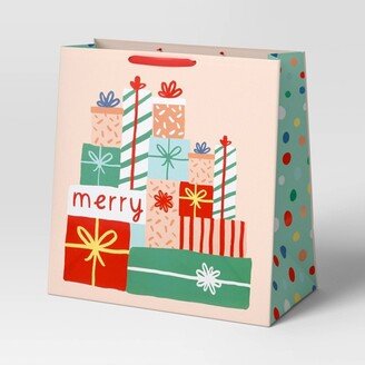 Extra-Large Square 'Merry' Stacked Presents Christmas Gift Bag Pink - Wondershop™