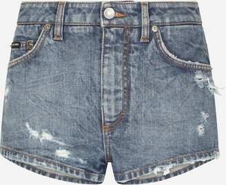 Denim shorts with ripped details