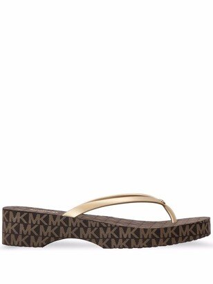 Lilo monogram-print flip flops