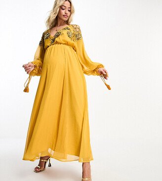 ASOS DESIGN Maternity embellished floral and lattice detail midi dress with elasticized waist in mustard