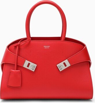 Hug red leather handbag