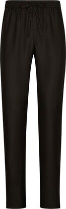 Essentials logo-patch silk trousers