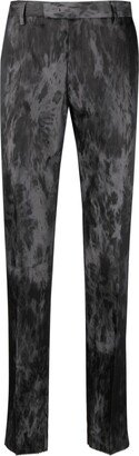 Road printed tapered-leg trousers