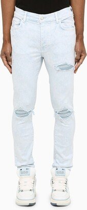 Light blue skinny jeans with wears